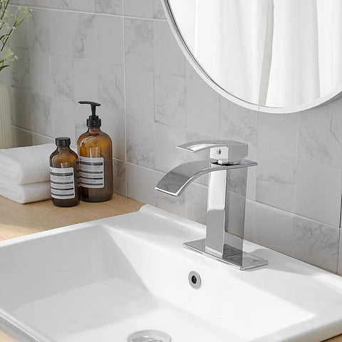 Oil Rubbed Bronze Bathroom Faucet With Waterfall Flow, One Hole, One Handle, deck mount, visible on a modern sink