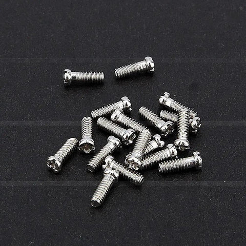 Precision Crafted Micro Stainless Steel Screws For Professional Watch Repairs And Antique Clock Restoration Hella Durable Tiny Watchmaker Parts Collection set on black background