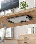 Under desk view of the Rock Solid Under Desk Laptop Mount Built Tough Adjustable Metal Shelf holding a laptop, enhancing workspace efficiency.