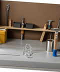 No Fuss Setup Fire Sprinkler Head Protector Cage Cover Clamps on workbench with tools in background, steel material.