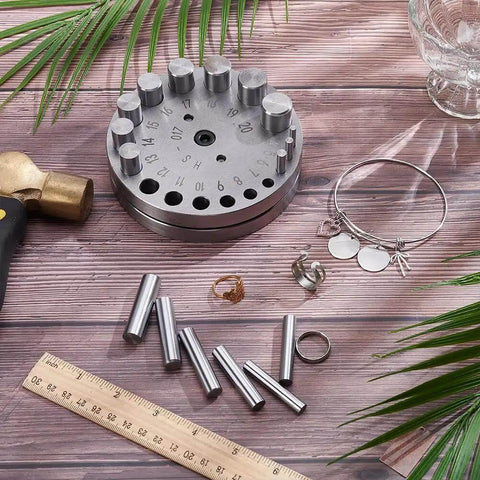 20 Size Steel Disc Cutter Set For Jewelry Making, Circle Cutter For Metal And Acrylic, tools and accessories on wooden surface