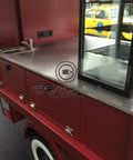 10.5 Ft Mobile Food Concession Trailer With Locking Drawers And Wide Prep Counter Turnkey Coffee Cart interior featuring stainless steel counter and glass display.