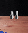 Tough As Nails Heavy Duty Sliding Door Roller Wheels For Closets And Bookcases Silent Swivel Track Casters With Reinforced Steel Screws Included, silver steel casters on wooden surface.