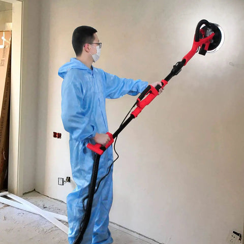 Person using Electric Drywall Sander With Vacuum And LED Lights 750W Pro Grade Power Foldable Handle And Extendable Pole indoors