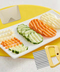 Crinkle French waffle fry potato slicer with yellow handle and blade cover, front view.