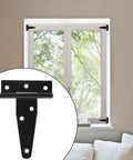 Close-up of a black T-strap hinge used on a window frame with a view outside. Six Pack Of 3 Inch Black T Strap Shed Hinges Heavy Duty Gate Strap Hinges
