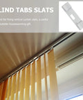 12 Piece White Metal Vertical Blind Repair Tabs Heavy Duty Replacement Clips For Window Shades installed on vertical blinds.
