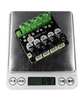 ODESC V4.2 24V Single Drive High Current High Precision Brushless Servo Motor Controller on digital scale showing 69.1 grams