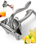 Nisuez Heavy Duty Manual Fruit Juicer Press For Lemons Limes Oranges with ergonomic grip and aluminum alloy design, shown juicing fresh fruits.