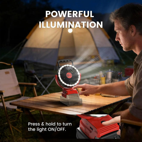 Person using Cordless 5 Inch Jobsite Fan For Milwaukee 18V Battery with LED indicator at a camping site on a wooden table.
