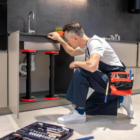 Man using Adjustable Cabinet Support Poles For Upper Cabinet Installation And Sink Support Extends 7.1 To 17.3 Inches