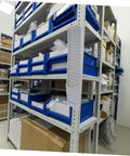 Expandable Plastic Card Holder And Multi Grid Desk Organizer displayed on a warehouse shelf with blue storage bins.