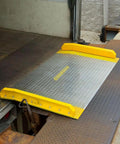 Heavy Duty Aluminum Dock Board Workhorse 60 By 48 Inch 15000 Lb Capacity Forklift Trailer Ramp for Warehouses, placed at dock.