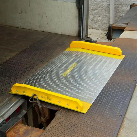 Heavy Duty Aluminum Dock Board Workhorse 60 By 48 Inch 15000 Lb Capacity Forklift Trailer Ramp for Warehouses, placed at dock.