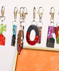 Top Tier Silver Lobster Clasp Kit Featuring Thirty Heavy Duty Snap Hooks Plus Thirty Flexible Split Rings Made For Dope Keychain Creations And Slick Jewelry Assembly with colorful glitter keychains