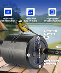 Close-up of Mak Maksutov Spotting Scope Kit with Finderscope and Wifi Camera for Digiscoping, showing buttons and bird perched on it.