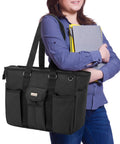 Boss Teacher Bag With Bottom Padded Pad And Foldable Cushion, Large Work Tote With Laptop Compartment, shown with person carrying notebooks