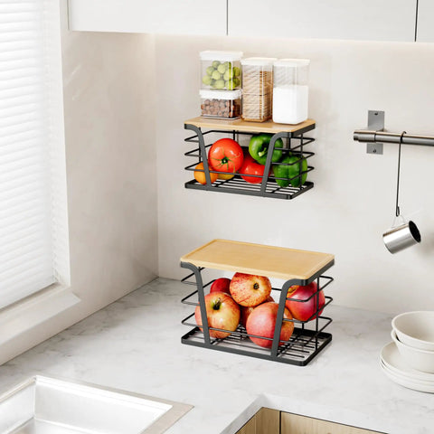 Two Pack Stackable Trash Bag Holder And Dispenser With Bamboo Top For Laundry And Kitchen Storage No Drill Wall Mount Organizer Great For Small Spaces And Busy Kitchens Keeps Bag Rolls Ready shown mounted on kitchen wall with fruit inside.