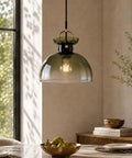 Tribesigns 11" Modern Pendant Lighting with Gradient Green Glass Shade hanging over table with gold bowl and fruit.