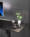 Boss Move Heavy Duty Clamp On Desk Extender With Foldable Keyboard Tray And Padded Wrist Support Expands Workspace For Sit Stand Tables Smooth Setup All Day Grind Black on black desk with headphones and lamp.