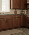 Solid Cabinet Pulls And Handles 10 Pack In Brushed Antique Brass on wooden kitchen cabinets