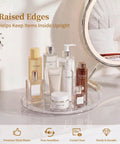 Smooth Spin Bathroom Vanity Tray For Counter 2 Pack 9 Inch Rotary Makeup Organizer A No Fuss Lazy Susan For Skincare Perfume And Daily Beauty Essentials with raised edges.