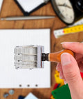 Kickin Retro Wooden Roller Date Stamp With Sleek Grip And Clean Roll On Ink System Delivers Flawless Calendar Marks From 2026 To 2036 in hand.