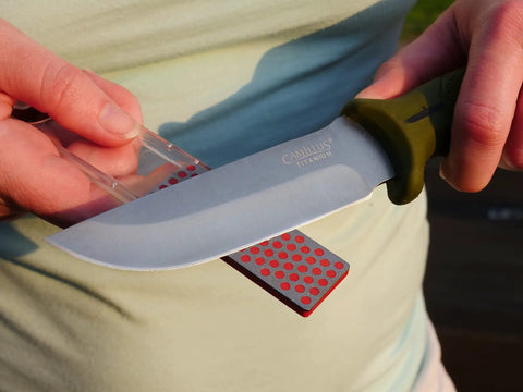 Pocket Diamond Sharpener With Monocrystalline Diamond Surface, Ultra Portable Keychain F70F Fine Grit Sharpener in use with knife