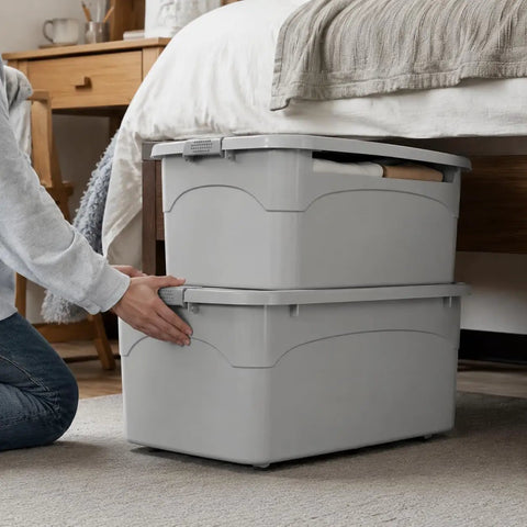 Hassle Free Stackable Storage Bins With Slick Rolling Wheels And Secure Tight Fitting Lids near bed for organizing clothes.