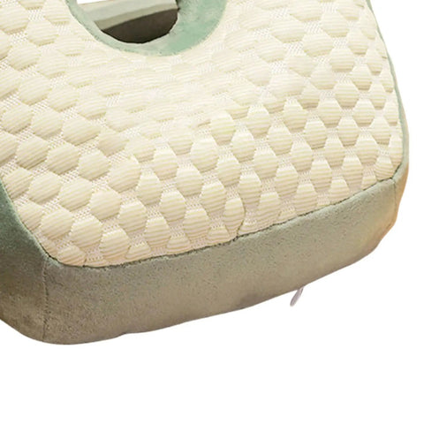 Close-up of Cool Ice Silk Napping Face Pillow For Table Naps, showing plush fabric and ergonomic design in green and cream.