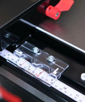 Close-up view of Advanced T Glide Rip Fence design with measuring scale, dovetail slots, and quick accessory mount for cabinet saw.