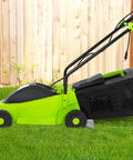 Corded Electric Lawn Mower 12 Amp Grass Cutter with Dethatcher 13 Inch Cutting Deck and Collection Bag on grass