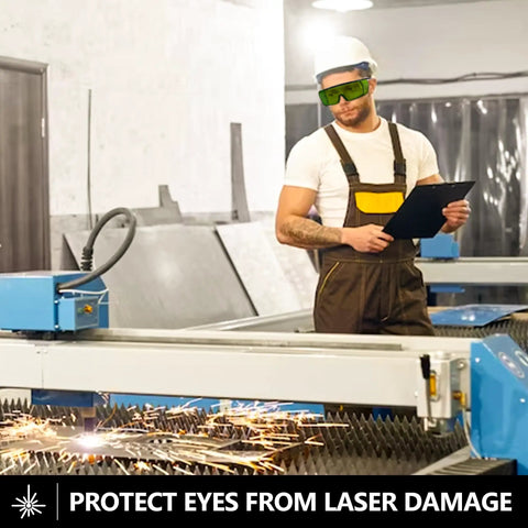 Man wearing Heavy Duty Laser Safety Glasses Delivering Straight Up Optical Density Blocking For Blue Violet And Infrared Lasers, working in industrial workshop.