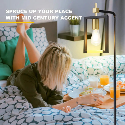 6006 Floor Lamp Black Edition Modern Tall Standing Light for Living Room next to table in cozy bedroom setting
