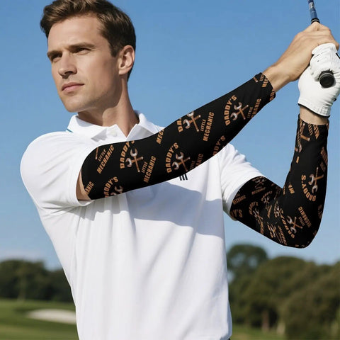 Top Tier Cooling Arm Sleeves In Breezy Ice Silk For Men And Women Featuring Secure Anti Slip Thumb Loops worn by a man while golfing.