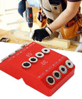 Heavy Duty Aluminum Pocket Hole Jig Drill Guide For Pro Woodworking Featuring Multi Angle Layouts At 30 45 And 90 Degrees With Slick Steel Drill Sleeves, red guide in use.