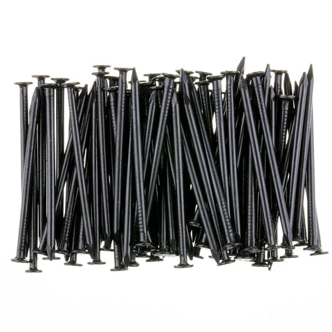 Close-up of 600 black nails in 4 sizes, nail assortment kit for picture hanging and woodworking finishing nails for drywall and repairs.