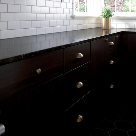 Kitchen cabinets with Champagne Bronze 3 Inch Cup Pull Cabinet Handles Set Of 10 For Cabinets And Dressers, 76mm, on dark wood drawers.