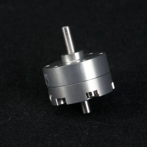 Close-up of 15mm Rotating Angle Rotary Actuator 180 Degree Vane Type Double Shaft Pneumatic Air Cylinder on black background