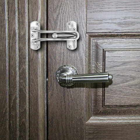 4 Pack Swing Bar Door Guard Set For Inside Doors, Built Tough Latch Guard Lock Reinforcement, shown in zinc alloy on wooden door