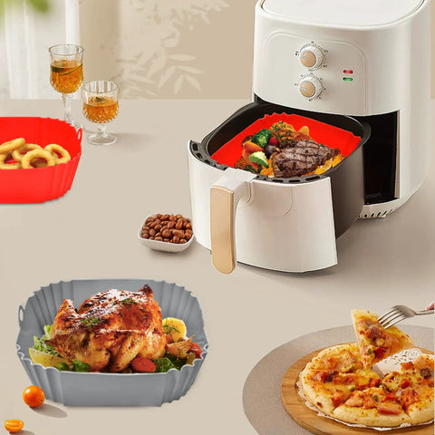 Square Red Silicone Air Fryer Liners 8 Inch Fits 4 To 6 Qt Reusable Nonstick Heat Resistant Up To 464F Dishwasher Safe Easy Cleanup Air Fryer Accessories in use with prepared foods and air fryer.
