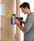 Man using Adjustable Door Hinge Jig And Router Template For 3 To 5 Inch Hinges on wooden door for precise mortises.