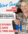 Front view of a smiling person holding a blue Original EZGrip Mat Mover for moving heavy stall mats (2 movers).