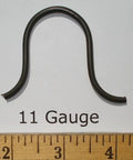 Three sinuous springs displaying 9 gauge, 11 gauge, and 12 gauge sizes, showcasing material variation for upholstery projects.
