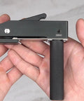 Rock Solid 3/4 Inch MFT Bench Holdfast Woodworking Clamp aluminum alloy, showing quick-acting grip mechanism held in hand.