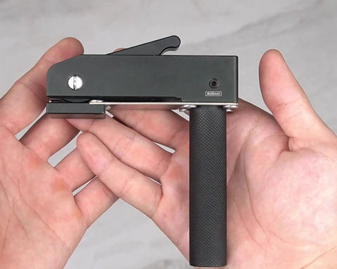 Rock Solid 3/4 Inch MFT Bench Holdfast Woodworking Clamp aluminum alloy, showing quick-acting grip mechanism held in hand.