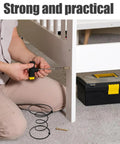 Person using a tool to install Heavy Duty Six Inch Sofa Spring Repair Kit, Eight Pack Kickass Metal Coil Springs For Couch Seat Fixin.