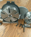 Boss Tier 12 Inch Precision Horizontal Vertical Rotary Table With Slick Gear Drive And 10 Inch Three Jaw Chuck on wooden surface.