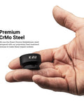 Hand holding single 22mm stubby impact socket with CrMo steel for Stubby One Half Inch Drive Impact Socket Set For Metric Ten To Twenty Four Millimeter Fifteen Piece Twenty Percent Shorter For Tight Spots Premium Chrome Molybdenum Steel Heat Treated With Manganese Phosphate Coating For Torque And Lasting Durability.