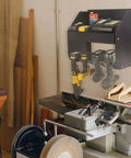 Heavy Duty Power Tool Rack for Electric Drill Wall Mount Organizer in garage with drills, batteries, and tools stored neatly.